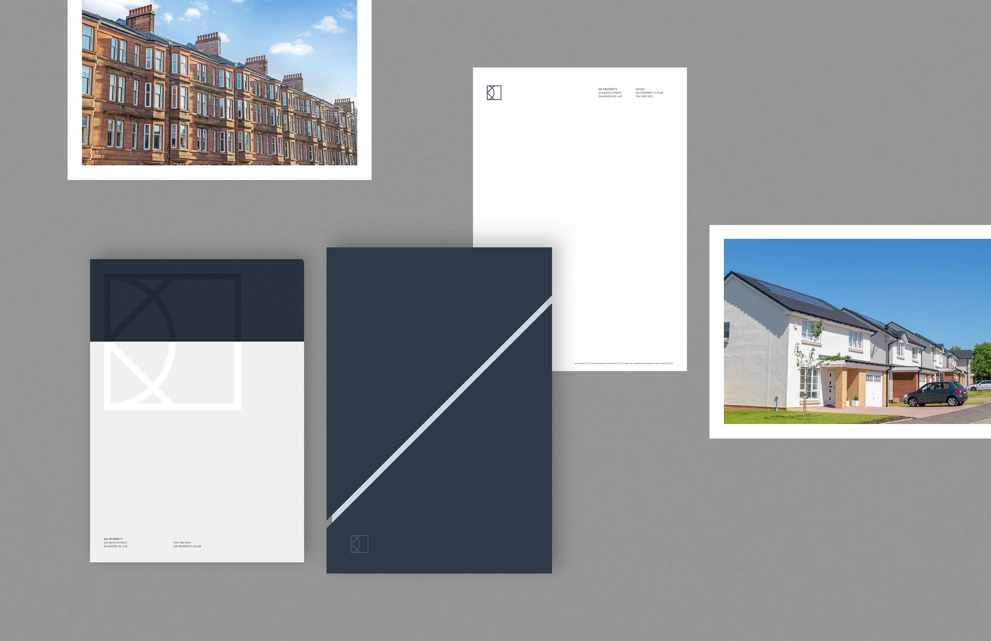Stationery mockup with navy brochure covers and letterhead beside photographs of tenements and new-build homes.